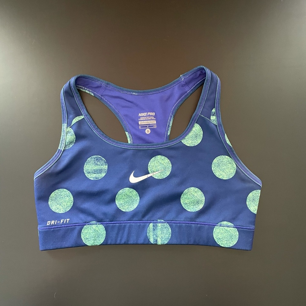 Blue and green polka dot Nike sports bra
